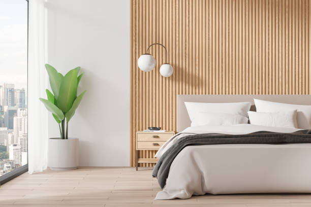 istock Stylish home bedroom interior with bed and nightstand, panoramic window 2158975189