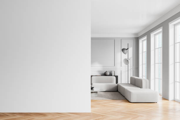istock Luxury home living room interior with couch and drawer, window. Mockup wall 2158975401