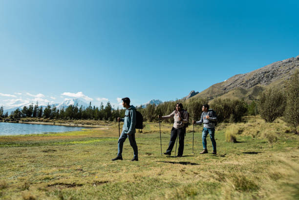 istock Friends doing a trail on a Laguna Radian, Peru 2158975889