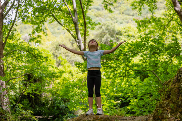 istock Young Girl in Forest 2158976126