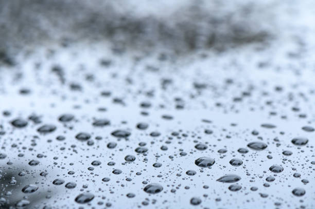 Raindrops on the windshield of a car 6