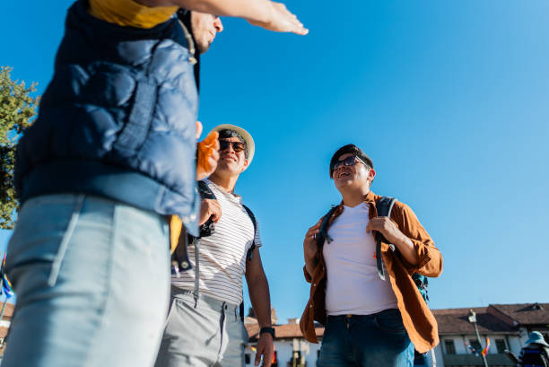 Male traveler gay friends talking on Cusco, Peru