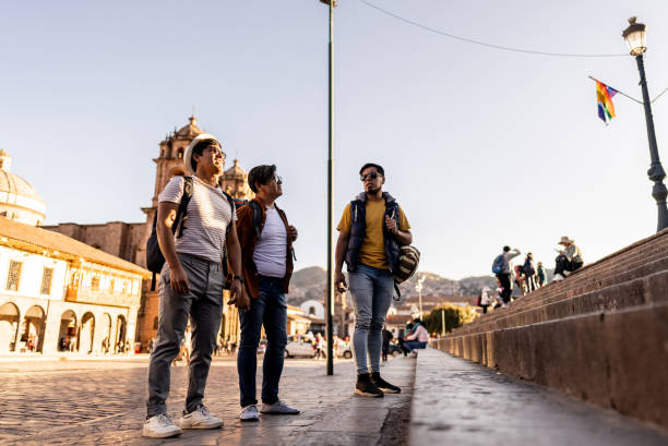 istock Male traveler friends walking and talking on Cusco, Peru 2158977595