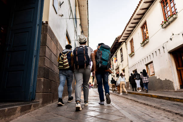 istock Male traveler friends walking and talking on Cusco, Peru 2158977648