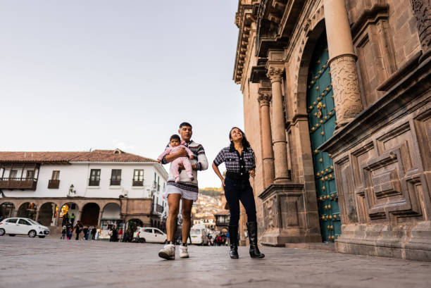 istock Couple walking with their baby daughter in Cusco, Peru 2158977793