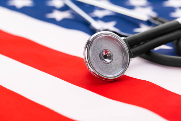 istock Stethoscope on American national flag, close up 2158977923