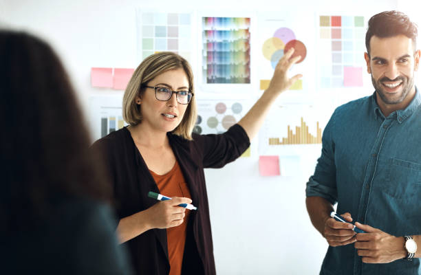 istock Presentation board, audience and business people planning, teamwork or brainstorming creative design, ideas or project. Designer creativity, agency collaboration and team cooperation on color choice 2158978387