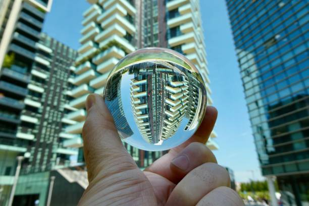 istock Crystal ball against skyscrapers 2158979713