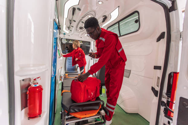 istock Two paramedics preparing equipment inside ambulance 2158985066