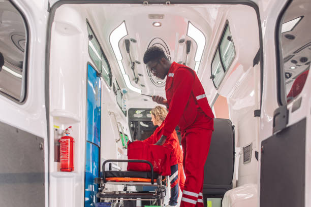 istock Two paramedics preparing equipment inside ambulance 2158985119