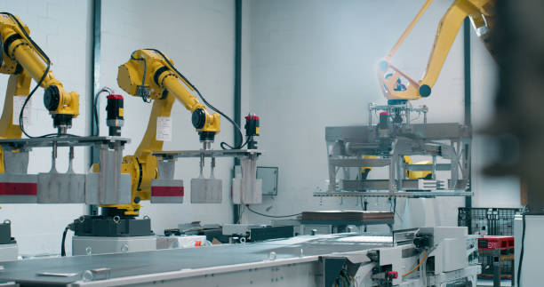 istock Robotics, machine and engineering in factory for industry 4.0, programming and manufacturing. Advanced technology, electronics or automation for workflow, efficiency and innovation at assembly line 2158986014