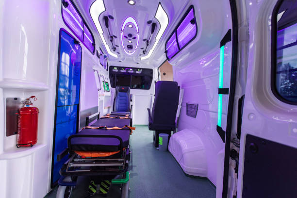 istock Modern ambulance interior with purple lights and a stretcher 2158986844