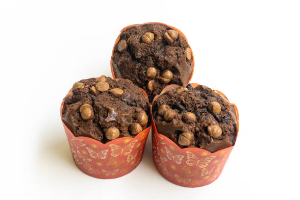 chocolate muffin isolated on a white background with copy space. Homemade fluffy and moist chocolate cakes.