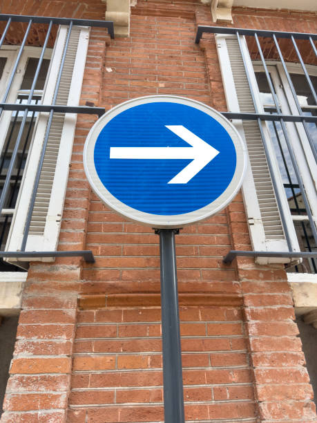 istock traffic arrow sign for one way direction to right 2158986988