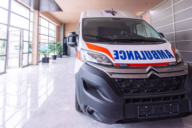 istock Modern ambulance parked inside building waiting for emergency call 2158987154