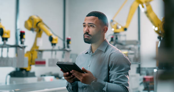 istock Man, tablet or working in production warehouse for business, leader with technology for operation inspection. Male manager, factory or ebook for check on manufacturing process, automation or industry 2158987906