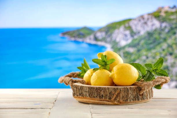 istock Lemon fruit on summer table with seascape background 2158988160
