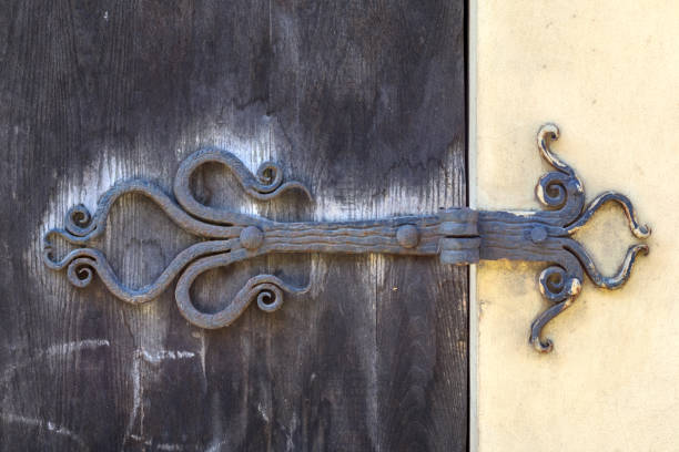old door with forged metal hinges