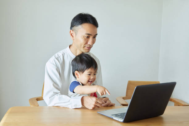istock Children and parents play with computers and smartwatches 2158989222