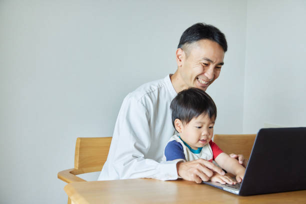 istock Children and parents play with computers and smartwatches 2158989231