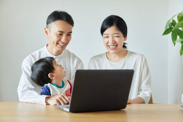 istock Children and parents play with computers and smartwatches 2158989232