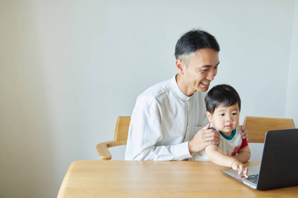 istock Children and parents play with computers and smartwatches 2158989245