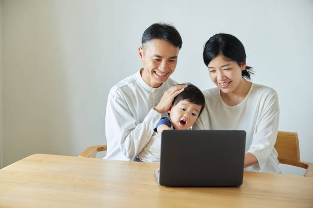 istock Children and parents play with computers and smartwatches 2158989259