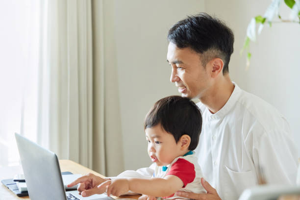 istock Children and parents play with computers and smartwatches 2158989261