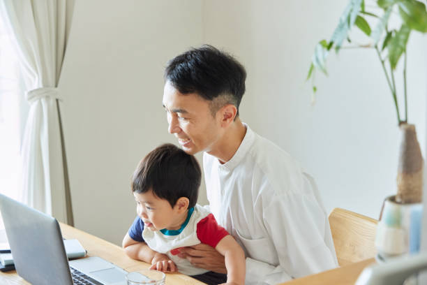 istock Children and parents play with computers and smartwatches 2158989270