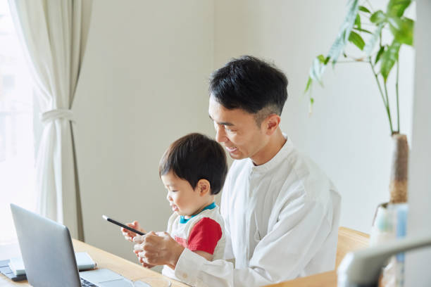 istock Children and parents play with computers and smartwatches 2158989272