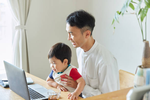 istock Children and parents play with computers and smartwatches 2158989273