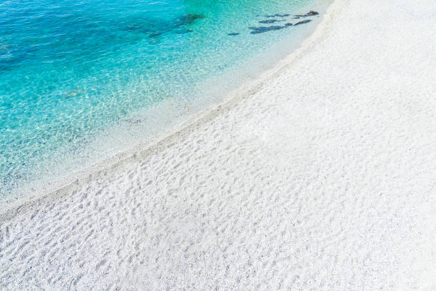istock Pristine White Pebble Beach with Crystal Clear Blue Waters in Cinque Terre, Monterosso. 2158991323