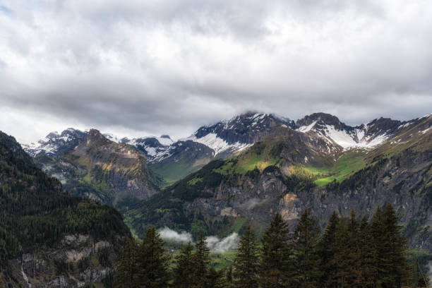 Various Bernese Alps mountain views along Oeschinensee lake hiking path. Taken in Kanderstag, Switzerland
