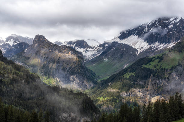 Various Bernese Alps mountain views along Oeschinensee lake hiking path. Taken in Kanderstag, Switzerland
