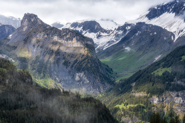 Various Bernese Alps mountain views along Oeschinensee lake hiking path. Taken in Kanderstag, Switzerland