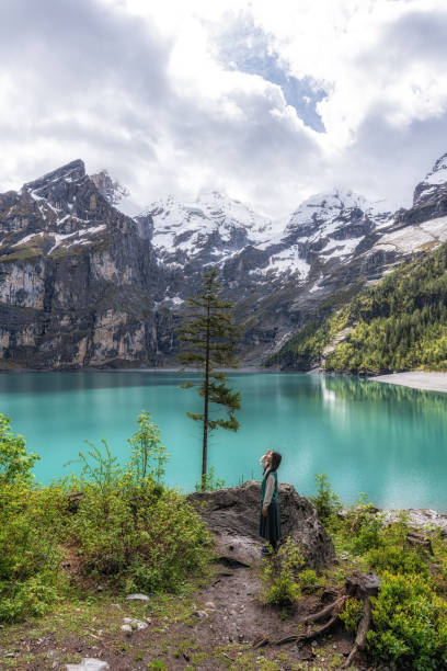 istock Girl in Oeschinensee Lake 2158992150
