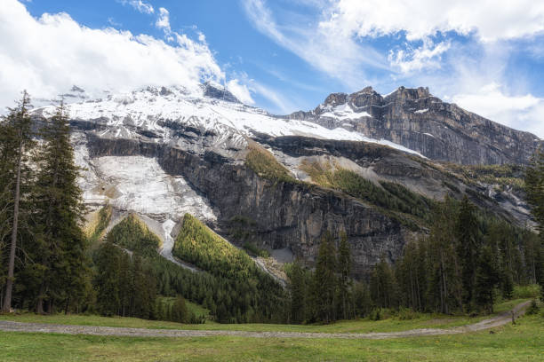 Various Bernese Alps mountain views along Oeschinensee lake hiking path. Taken in Kanderstag, Switzerland