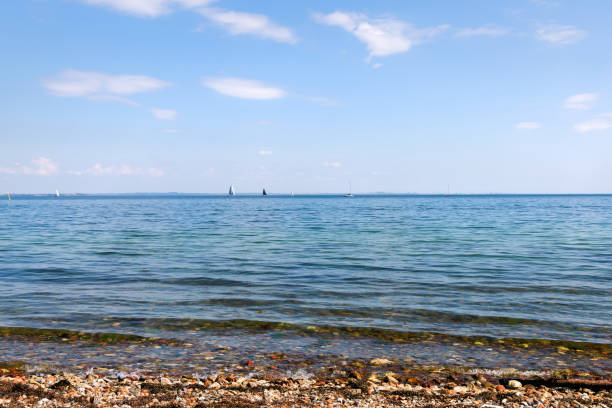 istock Blue sea and sailing boats on a sunny day 2158995116