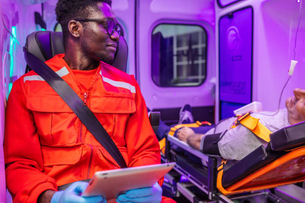 Paramedic Using Technology 60+ Paramedic Ipad Ambulance Patient Stock Photos, Pictures & Royalty ...