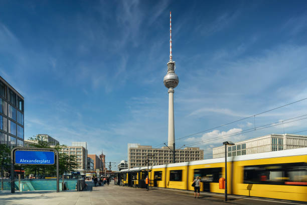 istock yellow tram at Alexanderplatz in Berlin in summer 2159000677