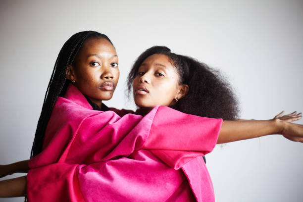 two fashion models wearing aduo dynamic fashion attire