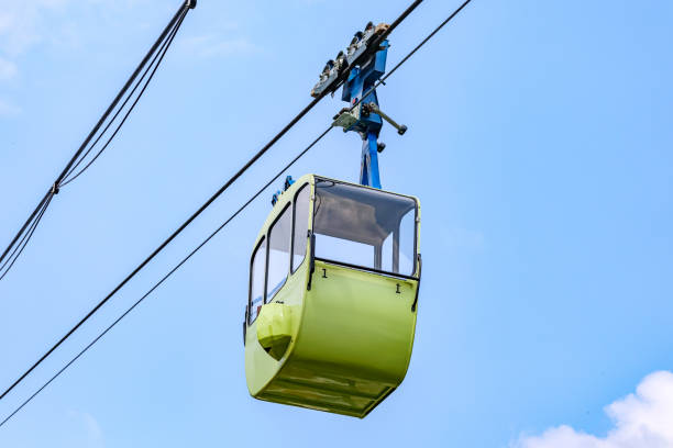 istock Empty green cabin hanging on cables of cable car 2159007927
