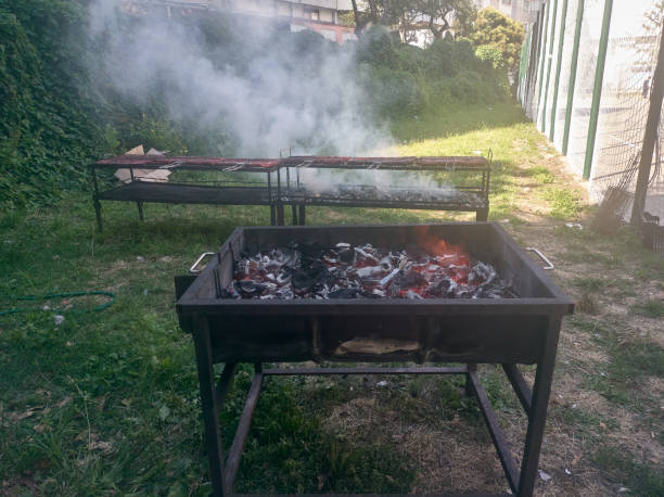 istock Delicious grilled chorizos smoking over the coals 2159011907