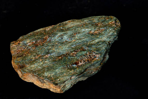 istock A sample of bright apple-green chlorite schist against a black background 2159016107