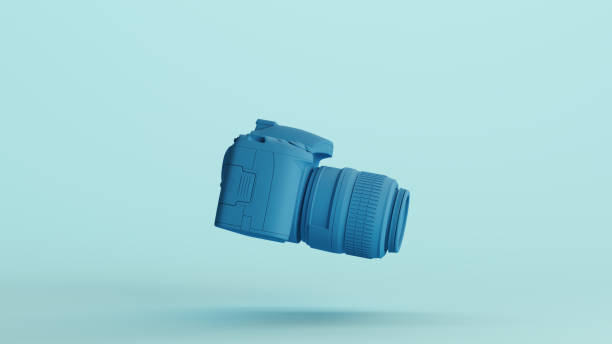 istock Blue camera dslr digital photography equipment lens optical pale background right view 2159017209
