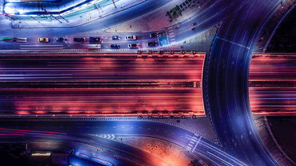 istock Expressway top view, Road traffic an important infrastructure, Drone aerial view fly in circle, traffic transportation, Public transport or commuter city life concept of economic and energ, transport. 2159017602