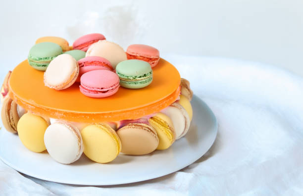 piece of cake dessert with fresh berries and macaroons