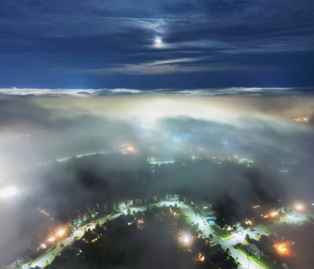 Foggy city. Silhouette of building. Mystical atmosphere