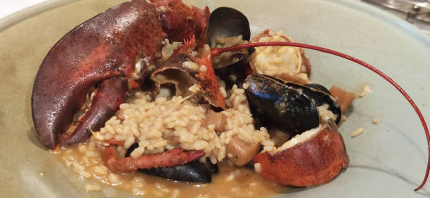 istock lobster rice paella with mussels 2159020955