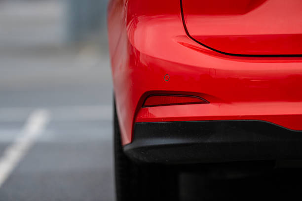 Rear bumper of a red car..